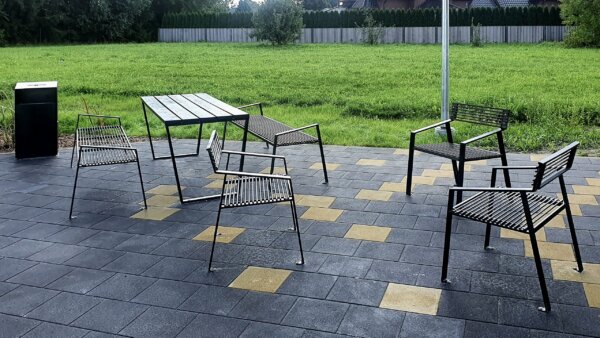 picnic benches with a tables in urban landscape