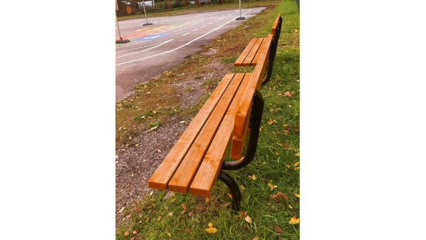 outdoor benches with wooden seats in the nature