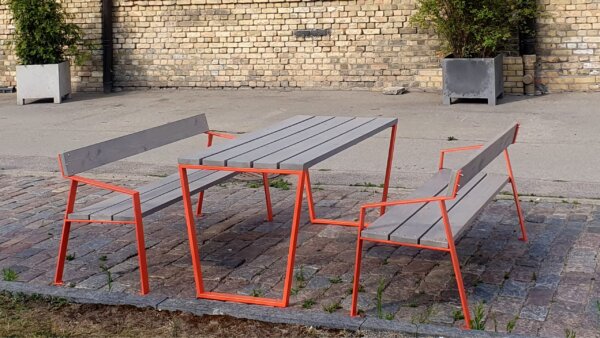 classic design wooden table with red metal legs