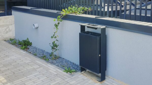 meta litter bin in an urban environment