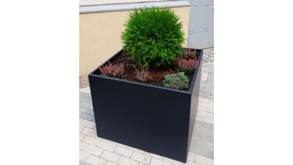 square shaped planter from steel with flowers